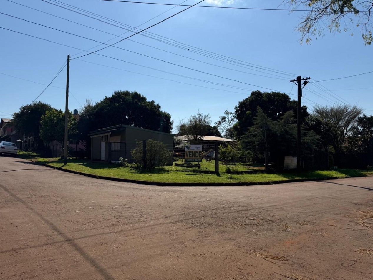 TERRENO CON CASA Y Dpto.