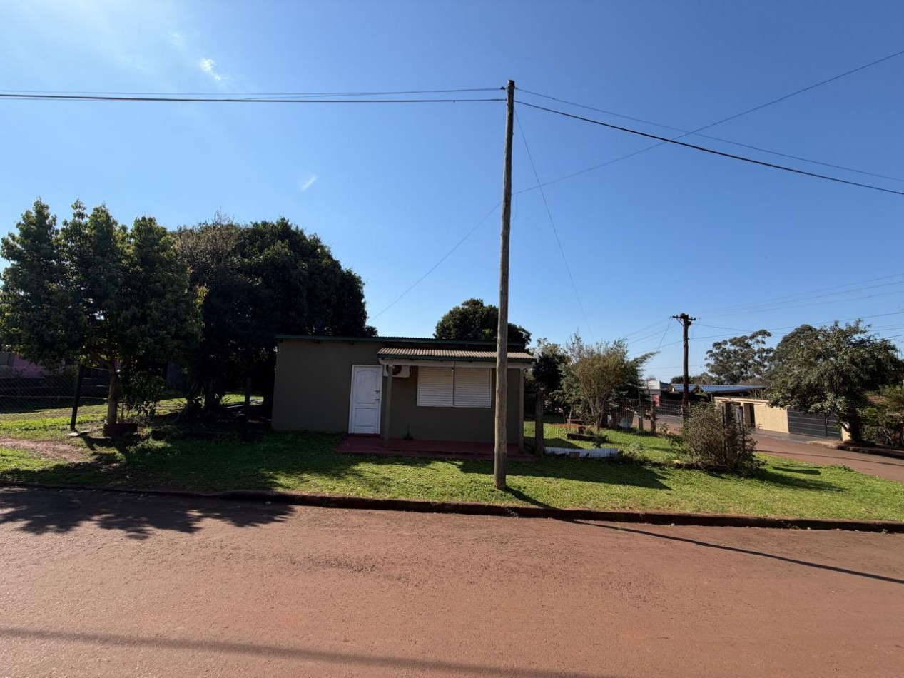 TERRENO CON CASA Y Dpto.