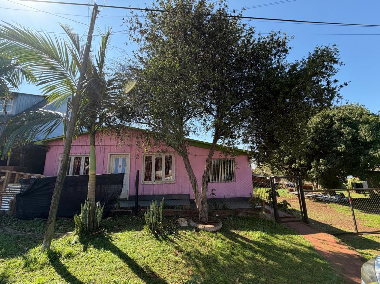 TERRENO CON CASA Y Dpto.