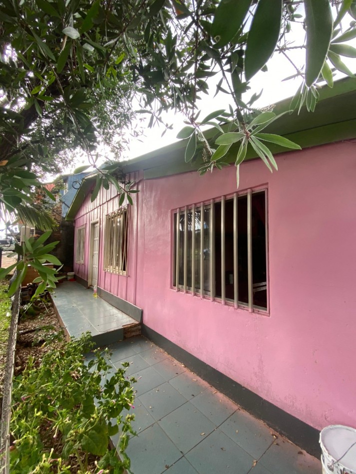 TERRENO CON CASA Y Dpto.