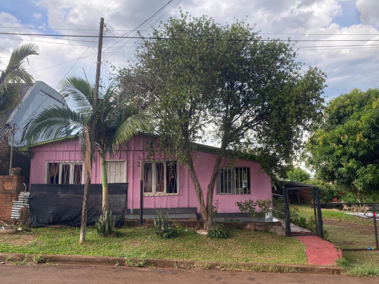 TERRENO CON CASA Y Dpto.