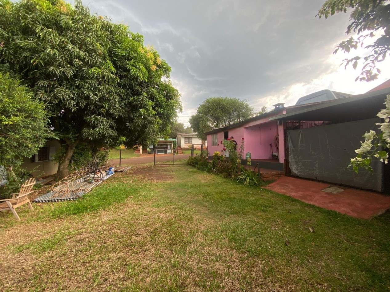 TERRENO CON CASA Y Dpto.