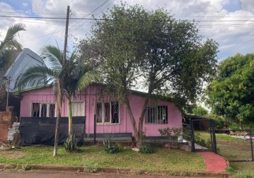 TERRENO CON CASA Y Dpto.